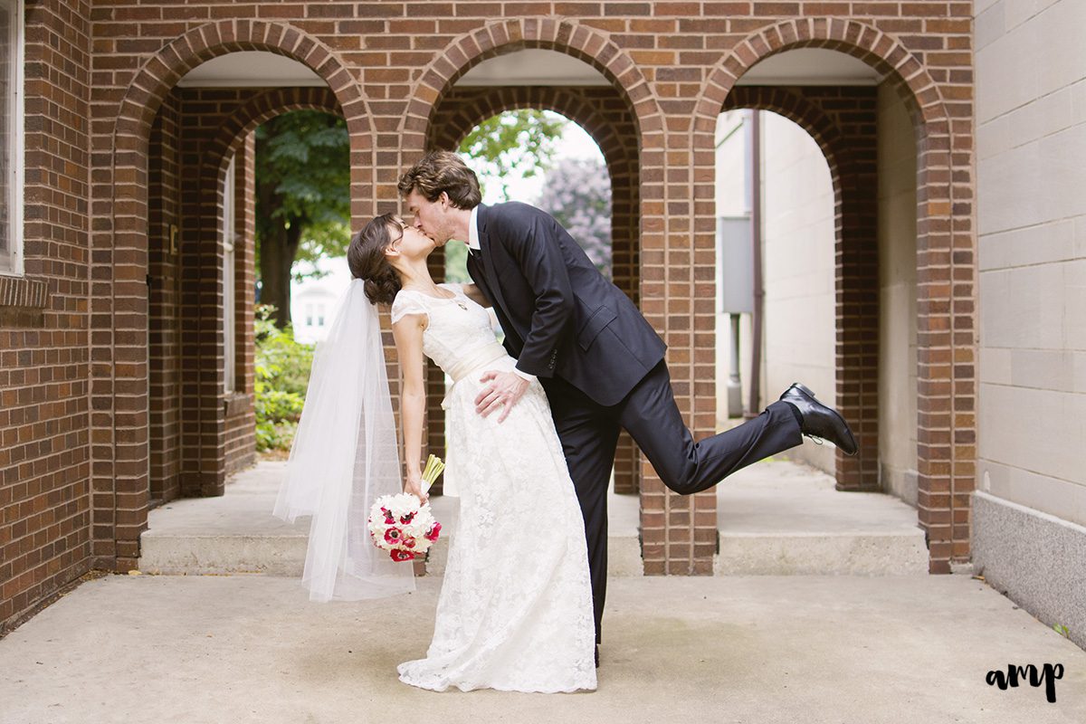 Bride & Groom kissing in arches Grand Junction Colorado Wedding Photographer