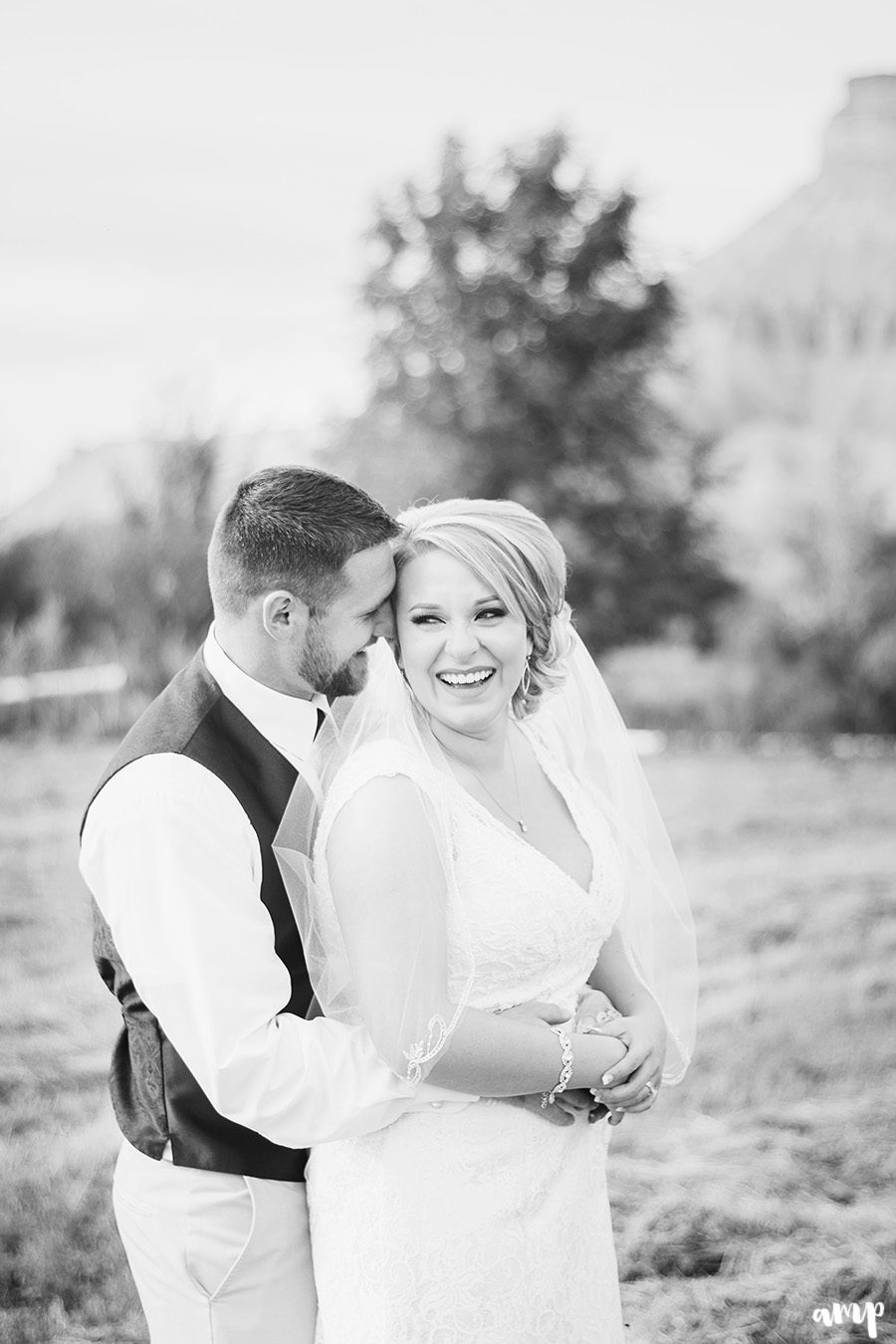 bride laughing  |  Palisade Wedding by amanda.matilda.photography