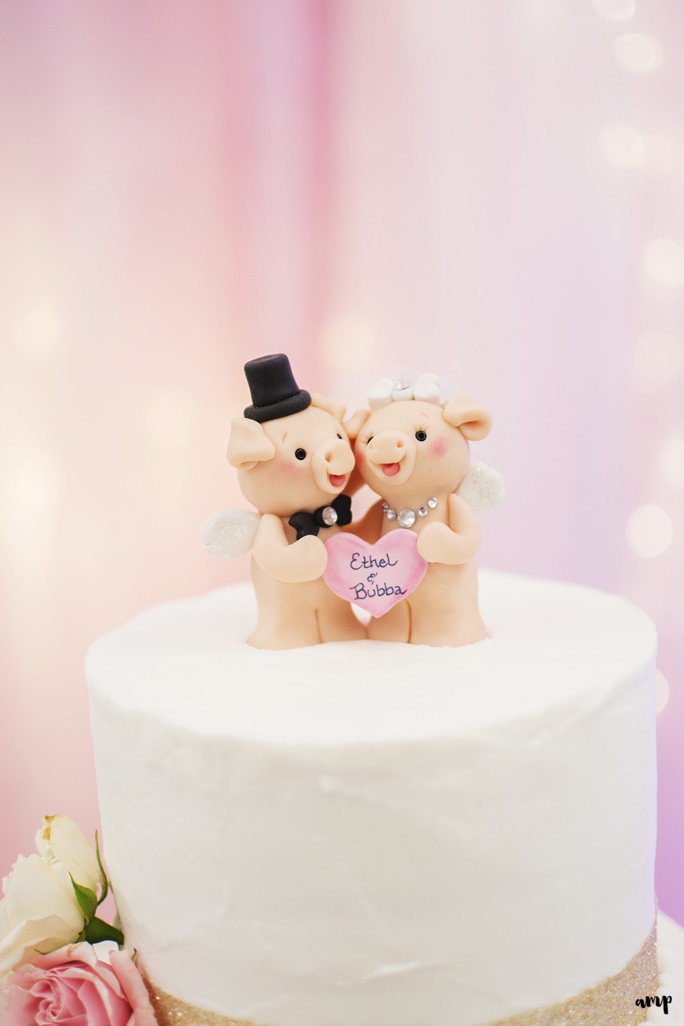 Wedding cake with pigs cake topper
