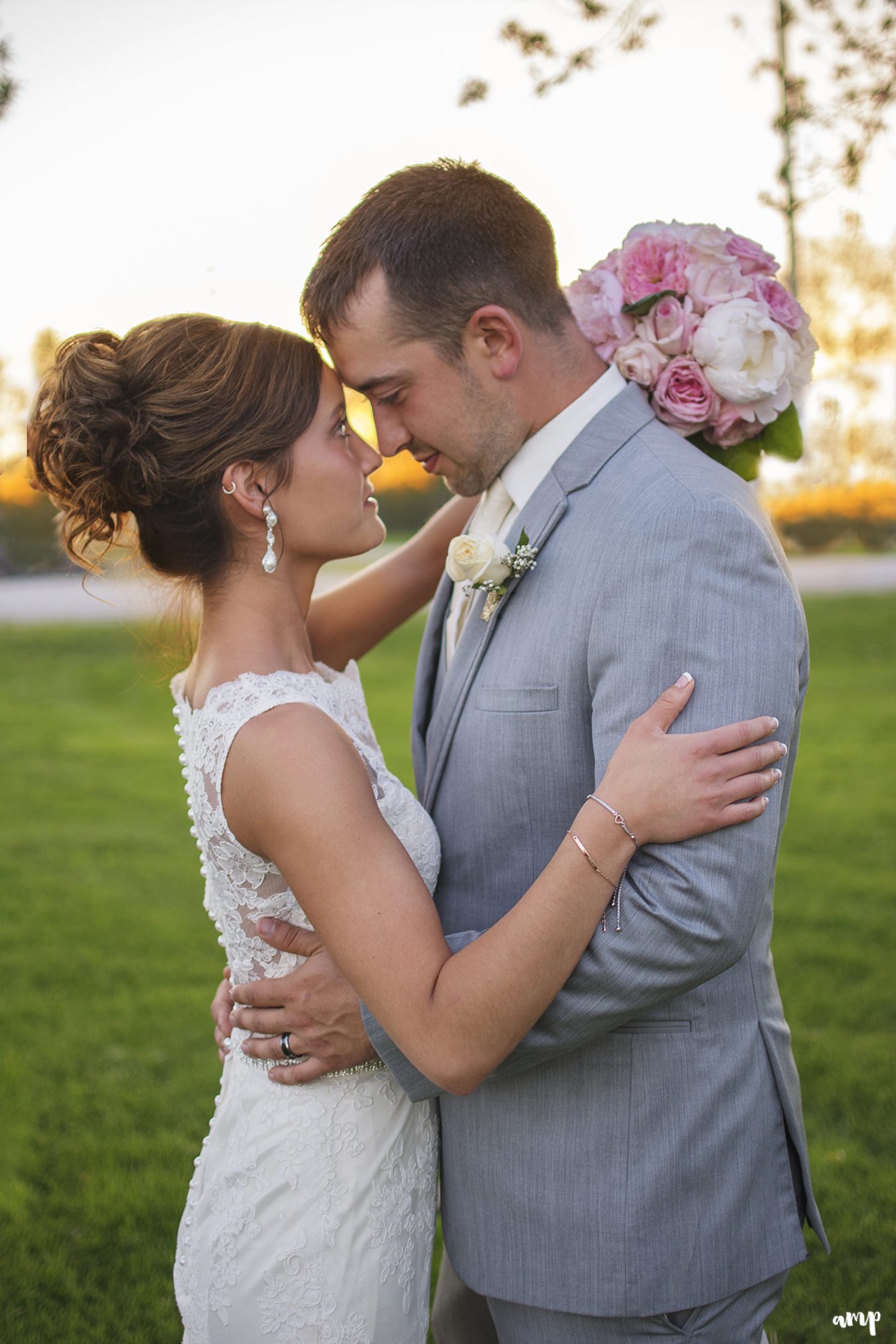 Bride and groom at sunset
