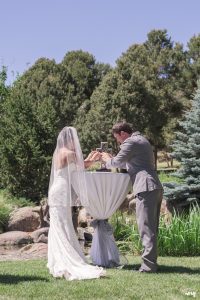 Bride and groom assemble Unity Cross